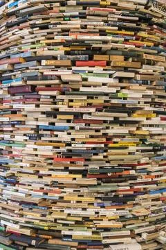 Artwork named Idiom designed by Matej Kren in 1998 is a book tunnel composed of Stock Photos