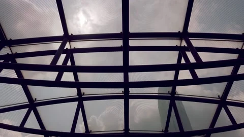 Arty Tracking Shot Looking up at Pier Roof on to IFC in Hong Kong Stock Footage 148316389