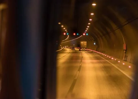 An arty tunnel view while driving Stock Photos