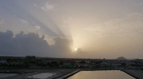 Aruba sun behind clouds Stock Footage 32115930