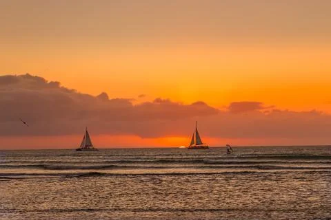 Aruba sunset sailing Stock Photos
