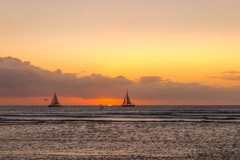Aruba sunset sailing Stock Photos