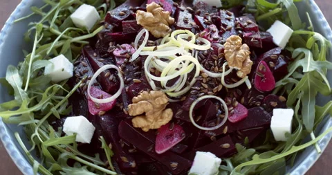 Arugula and baked beetroot salad. Stock Footage 279175666