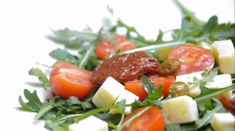 Arugula with cheese and tomatoes Stock Footage 46293758