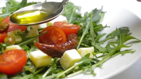 Arugula with cheese and tomatoes Stock Footage 46295007