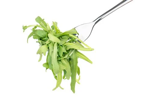 Arugula leaves on a fork Stock Photos