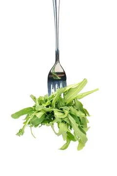 Arugula leaves on a fork Foto stock