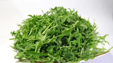 Arugula leaves rotating 360 top view.Fresh arugula Stock Footage 149786693