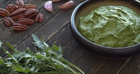 Arugula pesto with pecan nuts. Stock Footage 308745532