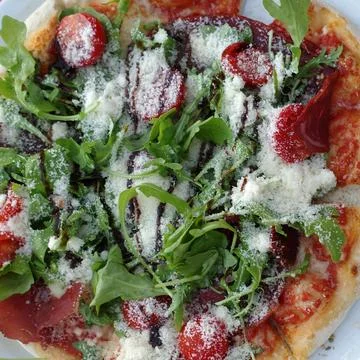 An arugula pizza  Stock Photos