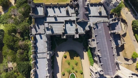 Arundel Castle aerial top-down reverse pan revealing turrets, stone walls and Stock Footage 342126226