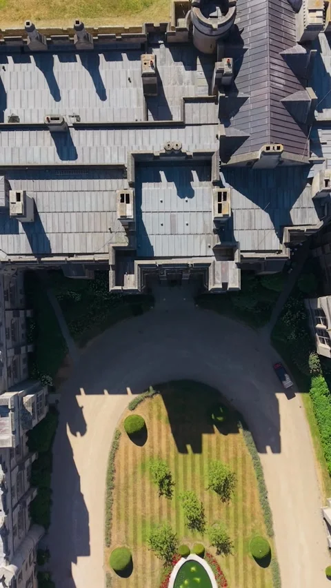 Arundel Castle aerial top-down vertical reverse pan over turrets, stone walls Stock Footage 342294860