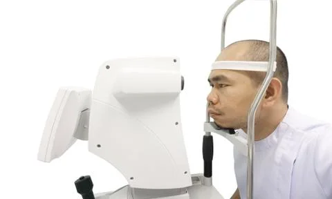 Asain man patient checking vision with  Intraocular lens measurement Stock Photos