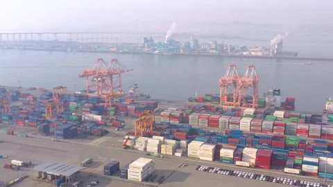 ASAN, SOUTH KOREA - OCTOBER 15, 2024: Busy port operations with cranes and Stock Footage 288577853