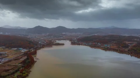 ASAN, SOUTH KOREA - OCTOBER 9, 2024: Autumn clouds gather over the tranquil Asan Stock-Footage 288571663