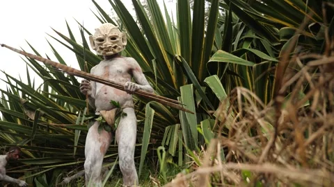 Asaro Mudmen tribe Bow hunting in Papua New Guinea. Stock Footage 310860324