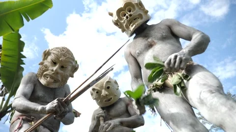 Asaro Mudmen tribe Bow hunting in Papua New Guinea. Stock Footage 310860706