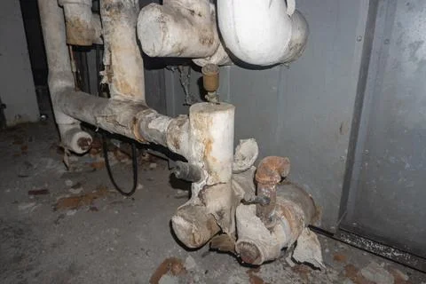 Asbestos containing pipe insulation raping. Stock Photos