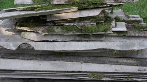 Asbestos removal. Old and very dangerous asbestos roof. Stock Footage 318445301