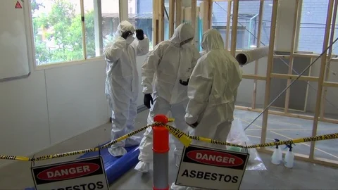 Asbestos safety using appropriate person protection 2 Stock Footage 102697652