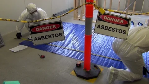 Asbestos safety, using appropriate personal protection 1 Stock Footage 102697659