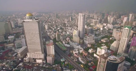 Ascending Aerial Drone Pan Over Sathorn And Silom Skyline, Bangkok, Thailand Stock Footage 79711027