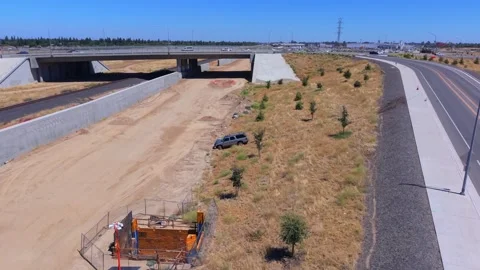 Ascending Aerial Drone Shot, Crashed Car Near CA HSR, Fresno Видео 341874834