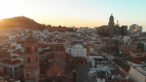 Ascending aerial drone view over historic European city at golden Stock Footage 345669469