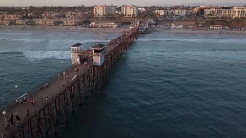 Ascending aerial reveal alongside pier w... | Stock Video | Pond5