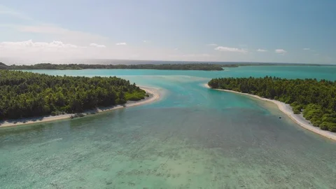 Ascending aerial shot reveals tropical lagoon in Pacific Atoll Stock Footage 116363847