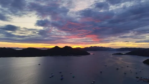 Ascending aerial view of dramatic sunset over Coron Bay islands, Palawan Stock Footage 325794519