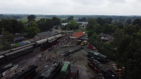 Ascending aerial view of steam train marshalling yard Stock Footage 247447701
