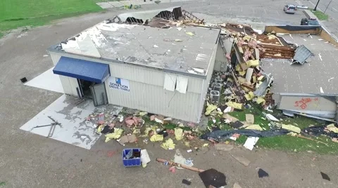 Ascending aerial view of tornado damage, destroyed building Stock Footage 56281475