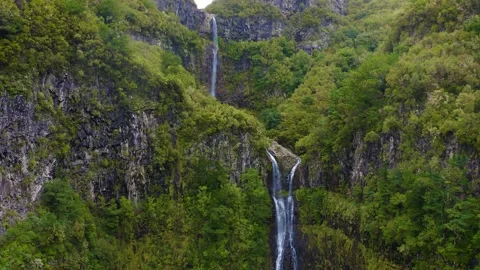 Ascending along the Risco waterfall in the Madeira Islands, Portugal Stock Footage 153276087