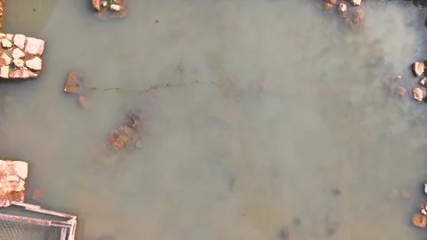 Ascending from Ancient Stone Pool to Reveal Historic Archaeological Site Stock Footage 340358467