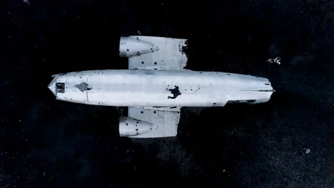 Ascending Birdseye View of the DC3 Plane Wreck in Iceland in 4K Stock Footage 89154247