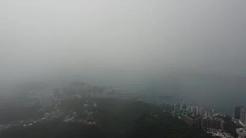 Ascending down coming out from cloud, Victoria Peak, Hong Kong, Aerial Footage Stock-Footage 246092285