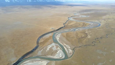 Ascending Drone Above Winding River Qilian Mountain Plateau China Stock Footage 330457501