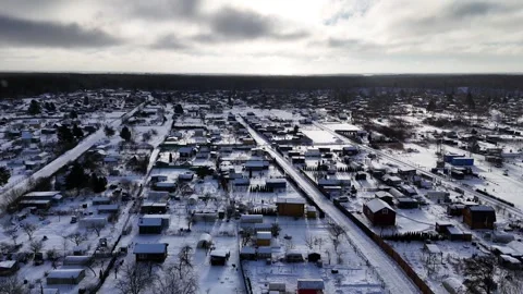 Ascending Drone Flight Over Snowy Rural Community Stock Footage 336718670