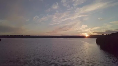 Ascending drone over River Tamar at Sunset 4k Stock Footage 320946552