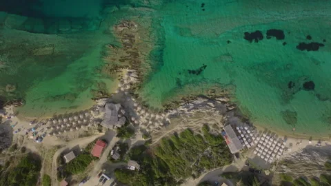 Ascending drone over tranquil beachfront Stock Footage 264864742
