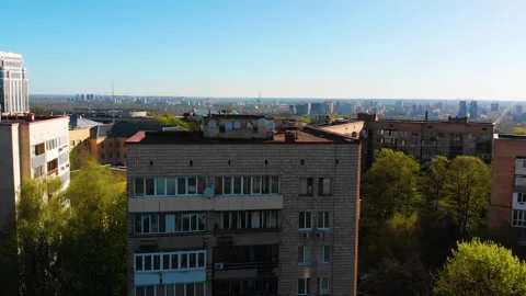 Ascending drone reveal of Soviet era apartment block Stock Footage 331889288
