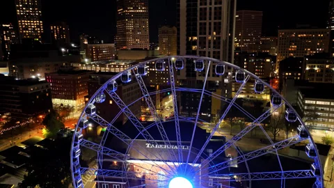 Ascending drone shot showing blue colored Skyview Atlanta and beautiful Stock Footage 252353873