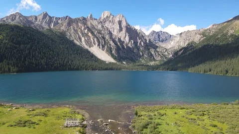 Ascending Drone View of Alpine Lake in Cuopu Valley Sichuan China Stock Footage 330279712