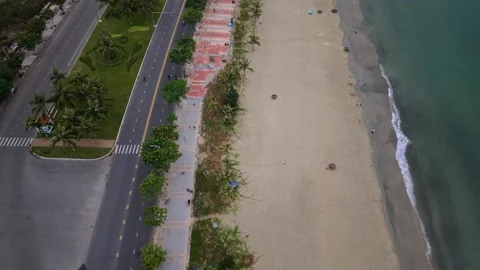 Ascending drone view of beach and coastal road in Da Nang, Vietnam Stock Footage 340597595