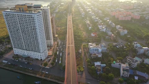 Ascending drone view of coastal road at sunrise in Da Nang, Vietnam Stock Footage 340874440