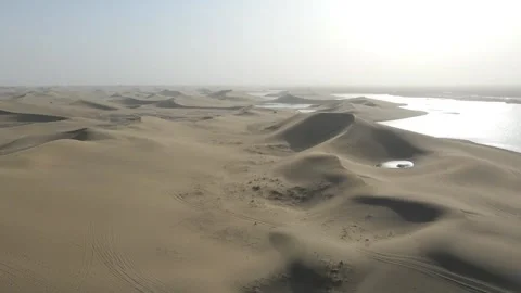 Ascending Drone View of Desert Oasis and Sand Dunes Ejina Inner Mongolia Stock Footage 330455130