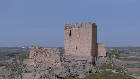 Ascending flight with a drone over the 9th century Oreja castle in the Stock Footage 275159524