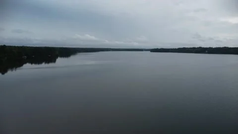Ascending flight over lake Video stock 239938875