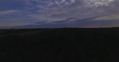 Ascending fly hovering panning over trees horizon evening 스톡 동영상 108747317